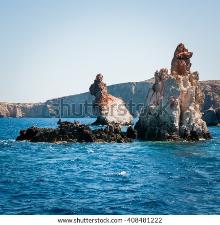stock-photo-picture-of-a-boat-near-a-rabbit-shaped-rock-408481222.jpg